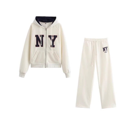Women's jogging pants with logo application on the side and elastic waist Amarae