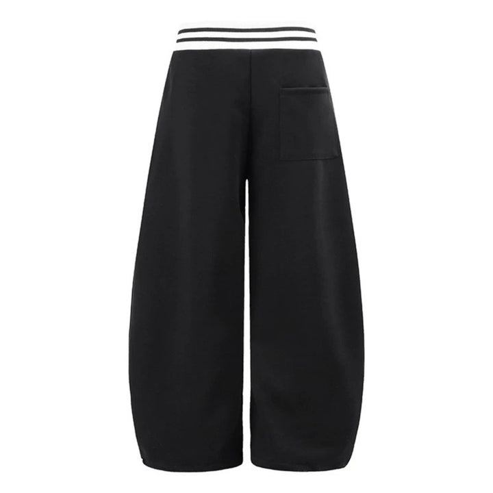 ladies culotte jogging pants with high-contrast waistband, patch pockets, and drawstring hem.