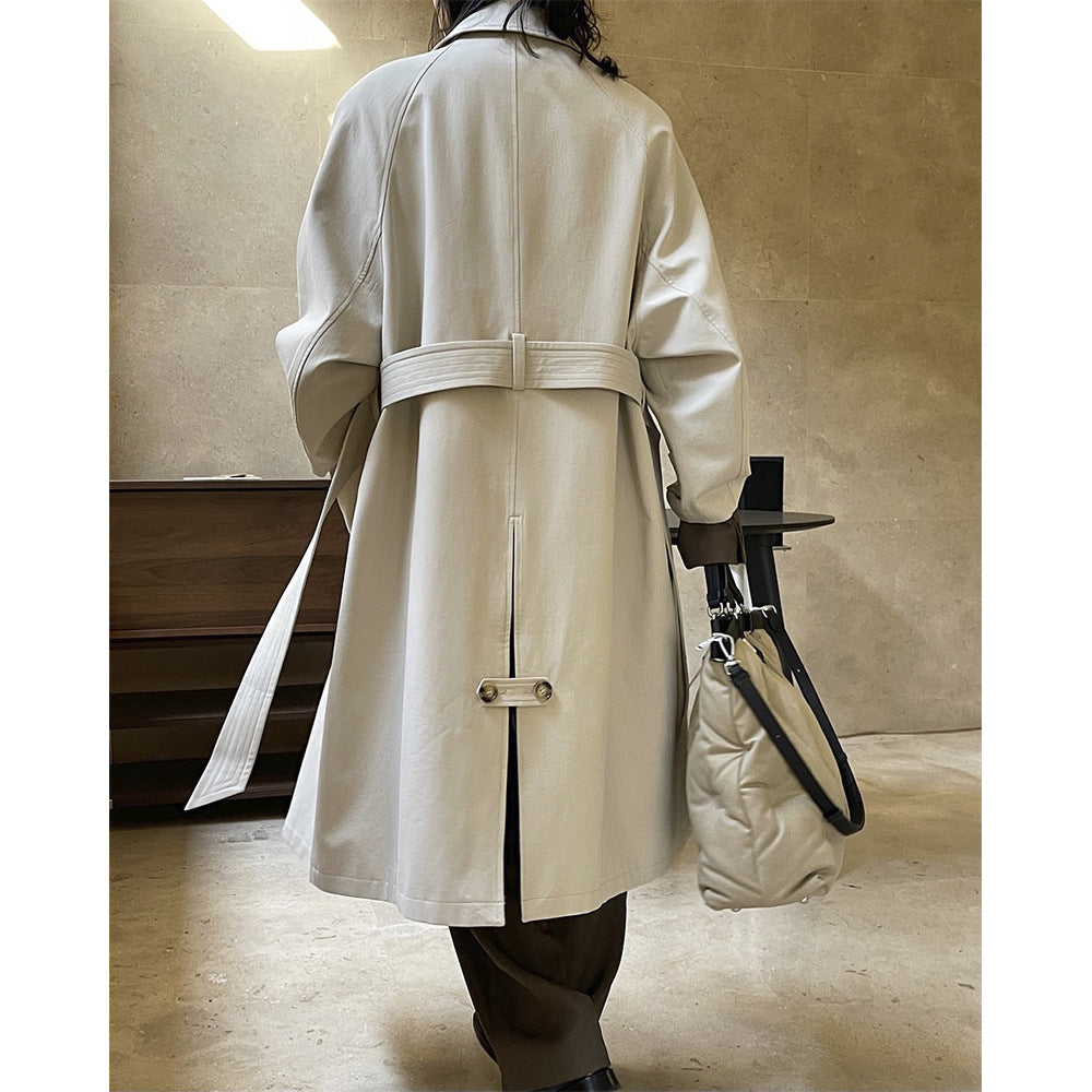 Women's longline coat in minimalist trench style with side pockets Amarae