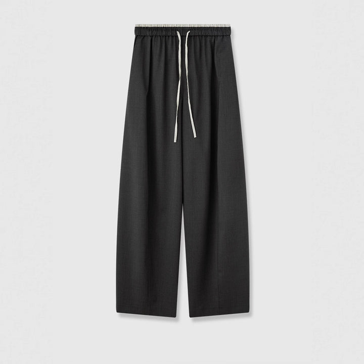 Pantalons en tissu large pour femmes avec taille élastique et poches pratiques Chic & Stil