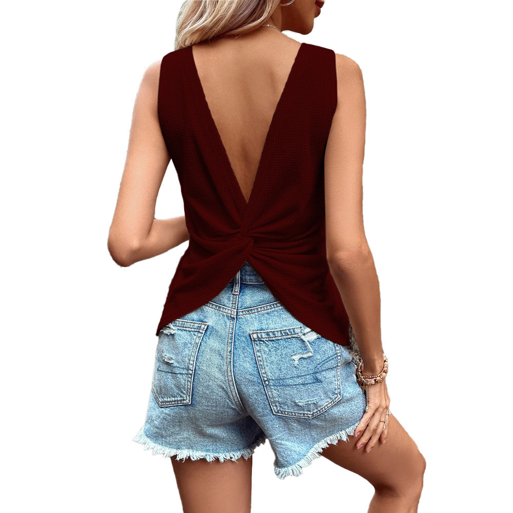 Haut élégant pour femmes avec découpe dans le dos et détail torsadé Chic & Stil