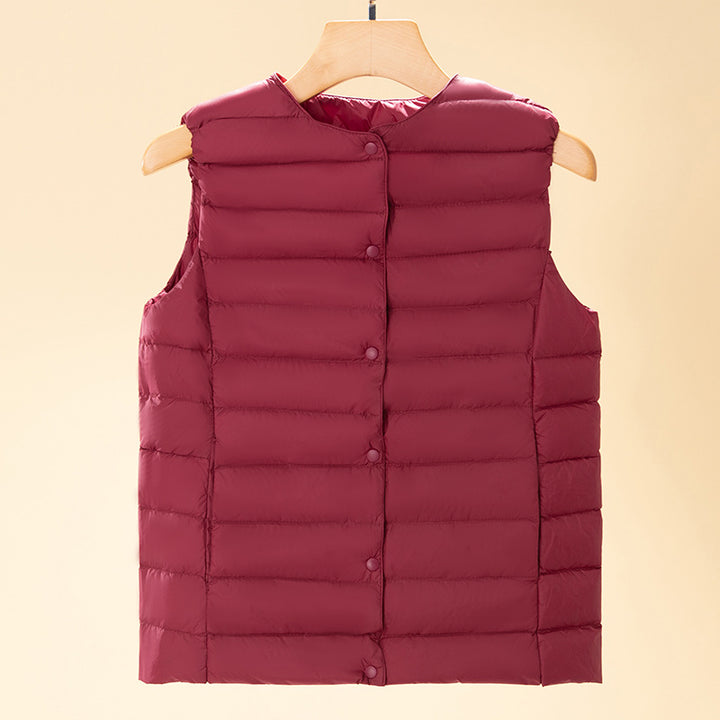 Women's sleeveless quilted thermal vest with round neck and snap button placket Amarae