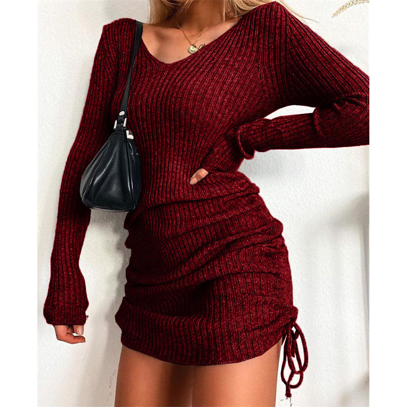 Ribbed knit dress for women with deep V-neck and adjustable ruching Lune London