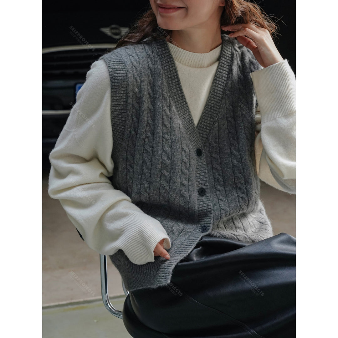 Women's chunky knit cable vest with deep V-neck and button placket Amarae