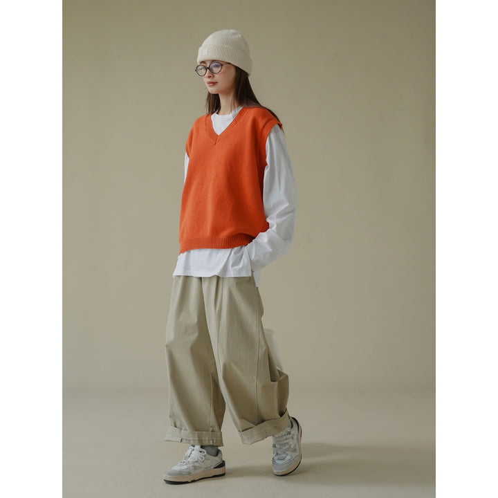 Women loosely cut sleeveless V-neck fine-knit vest with deep armhole and ribbed hem Amarae
