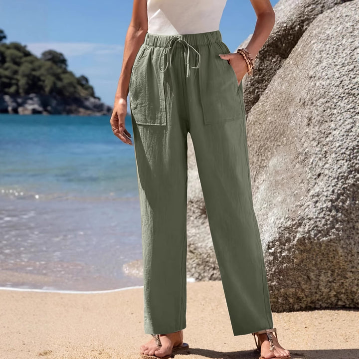 Loose beach pants for women with elastic waistband and practical pockets Lune London