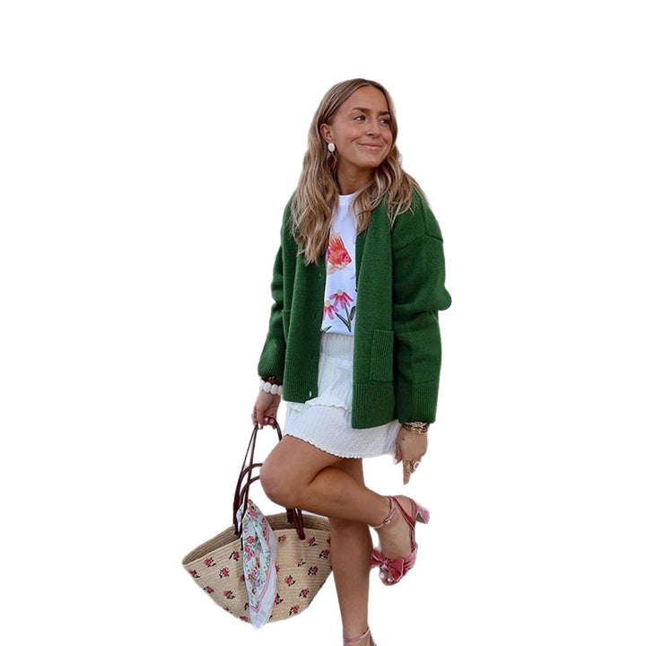 Women's oversized knit cardigan with decorative button placket, patch pockets, and elongated cuffs Amarae