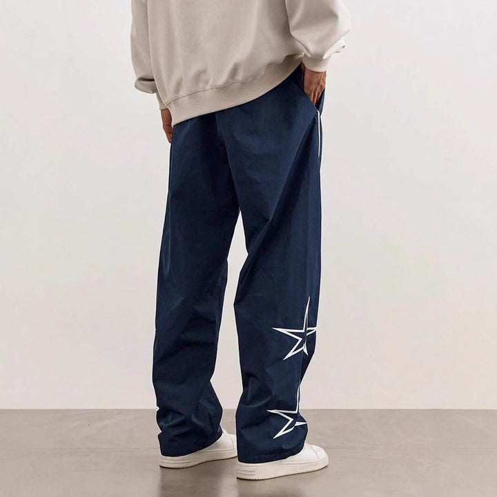 Sport leisure pants for men with chic and stylish side appliqués