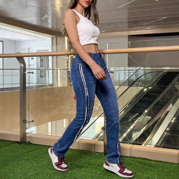 Women's waist-accentuated high-waist jeans with vertical raw-edge stripes and slight flare Amarae
