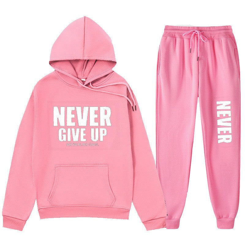 Women's training pullover and jogging pants in motif set with motivating print Chic & Stil