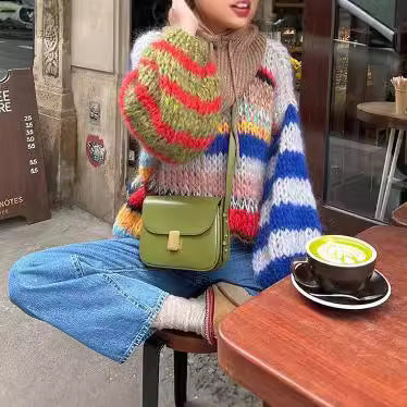 Comfortable knit sweater for women with flared sleeves and a colorful striped pattern Lune London