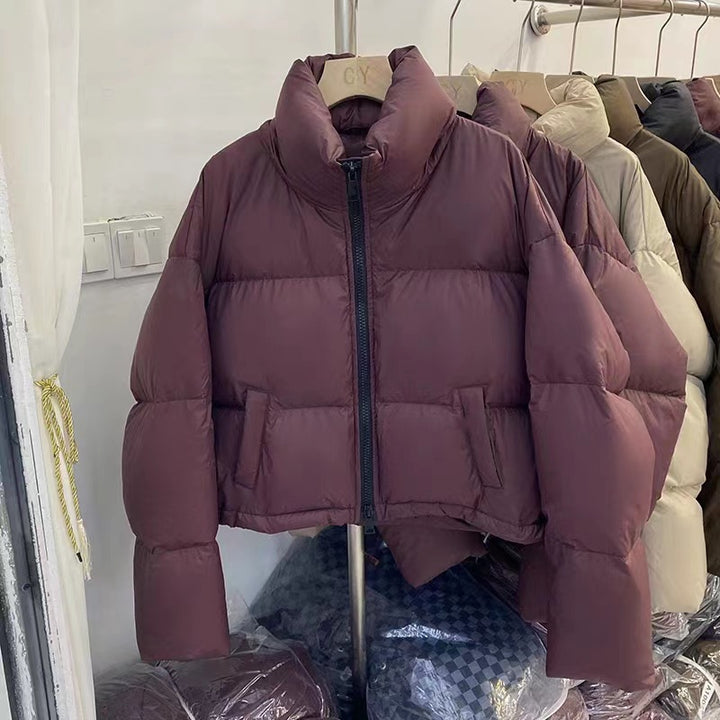 Ladies short functional quilted jacket with high collar and side pockets Amarae