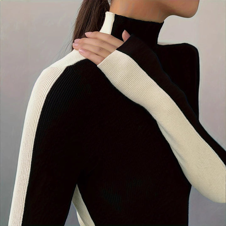 Pull à col roulé de haute qualité pour femmes avec des manches contrastées Chic & Stil