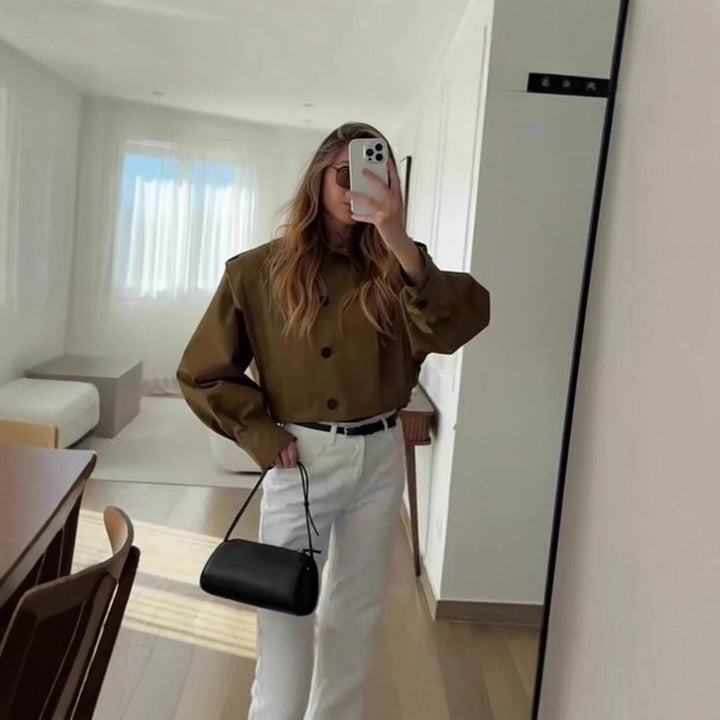 Fitted feminine blouse with continuous button details Lune London