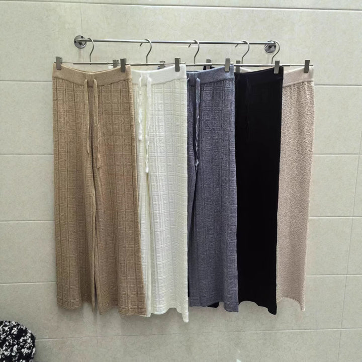 Pantalon palazzo élégant pour dames avec taille haute et ceinture à nouer sur le côté Chic & Stil