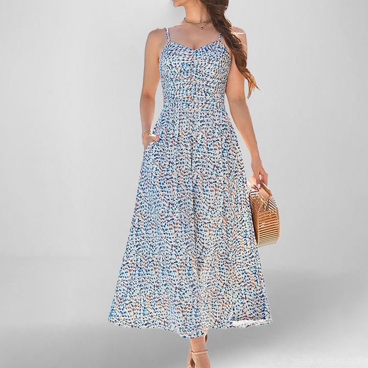 Robe maxi femme avec fines bretelles et poches latérales pratiques Chic & Stil
