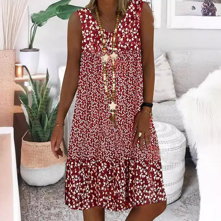 Airy summer dress for women with a playful floral pattern and a fluid silhouette Lune London