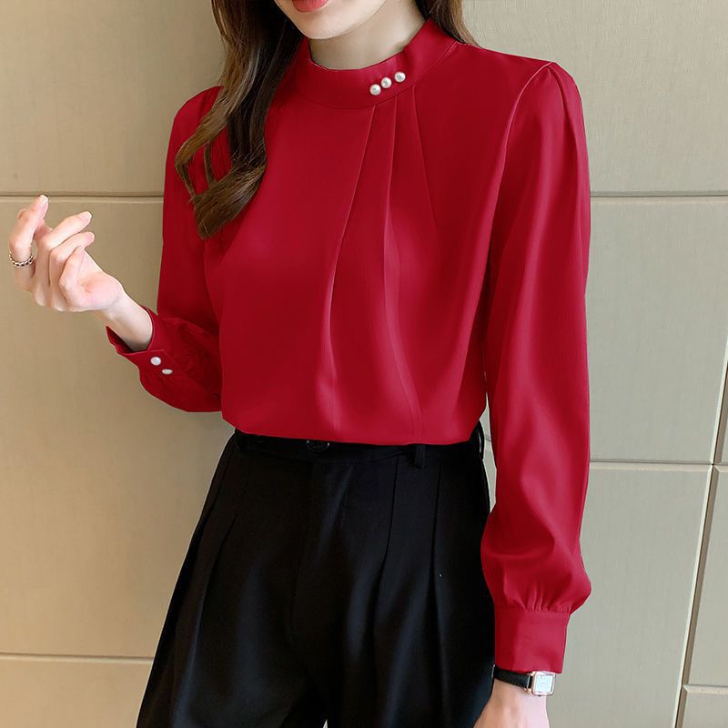 Blouse élégante pour femmes avec des détails en volants et un col stylé Chic & Stil