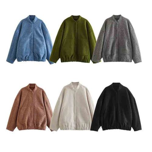 Ladies oversized fluffy coat with practical pockets and an elegant high collar Amarae