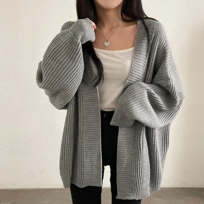 Plus size knitted jacket for women with wide sleeves and a structured texture Lune London