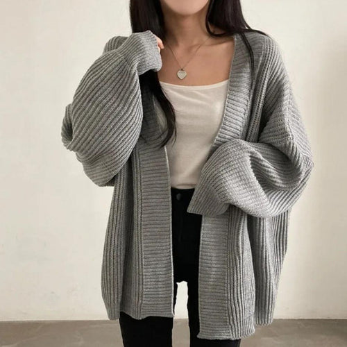 Plus size knitted jacket for women with wide sleeves and a structured texture Amarae