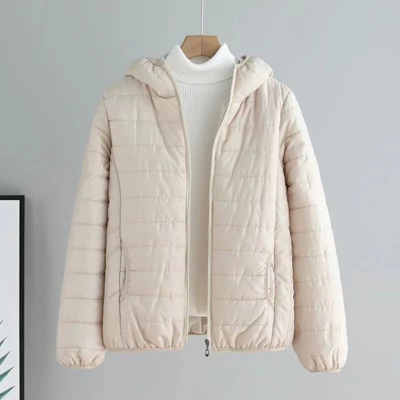 Ladies quilted transitional jacket with practical pockets and hood Amarae
