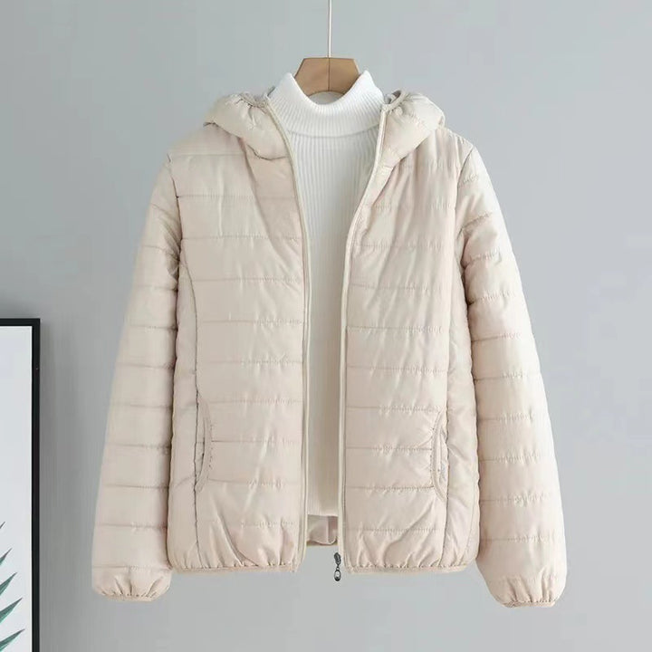 Ladies quilted transitional jacket with practical pockets and hood Amarae
