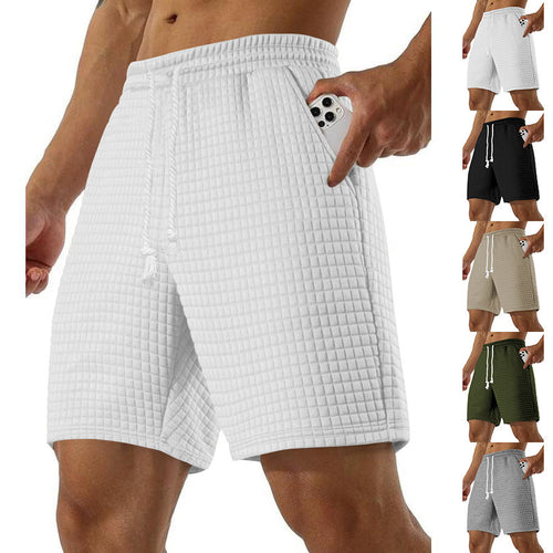 Men's sports shorts in breathable material with practical side pockets Amarae