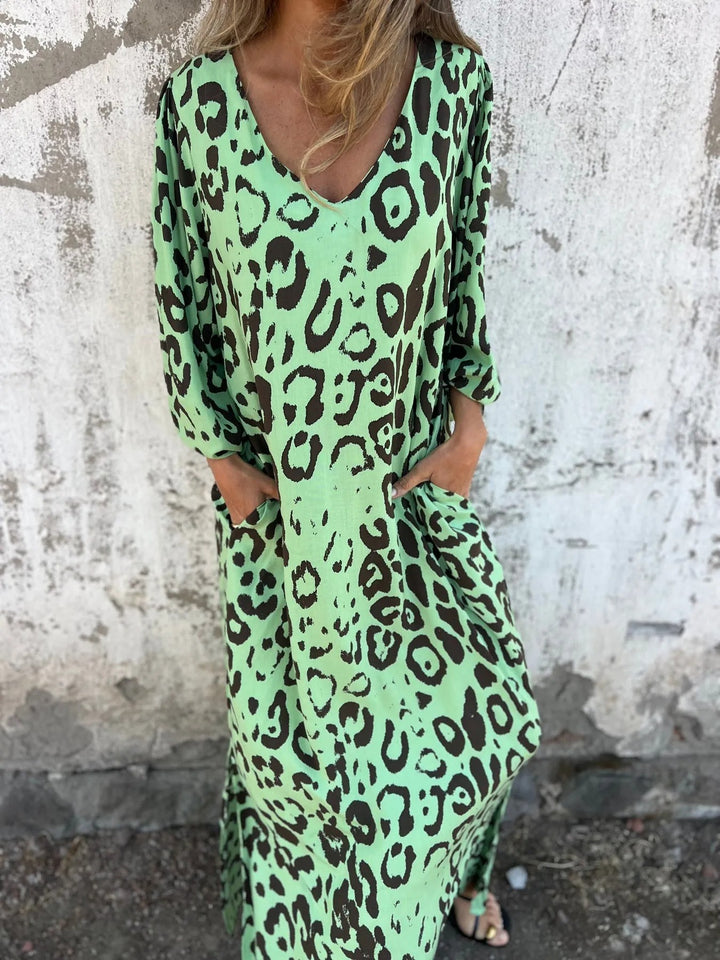 Maxi dress for women with deep V neckline and side pockets Lune London