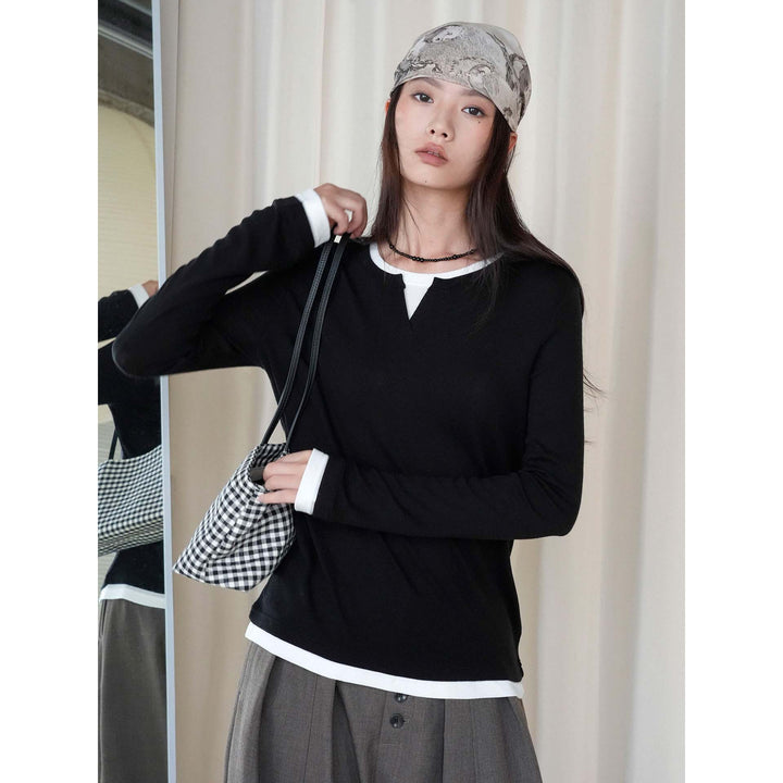 Women layered look long sleeve with notch at the neckline made of soft sweat fabric