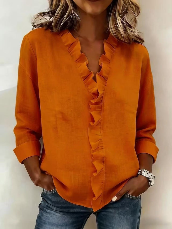 Women's romantic blouse with ruffle details and V-neck Lune London
