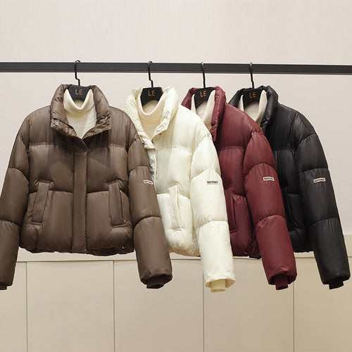 Short and trendy down jacket for women with practical entry pockets Amarae