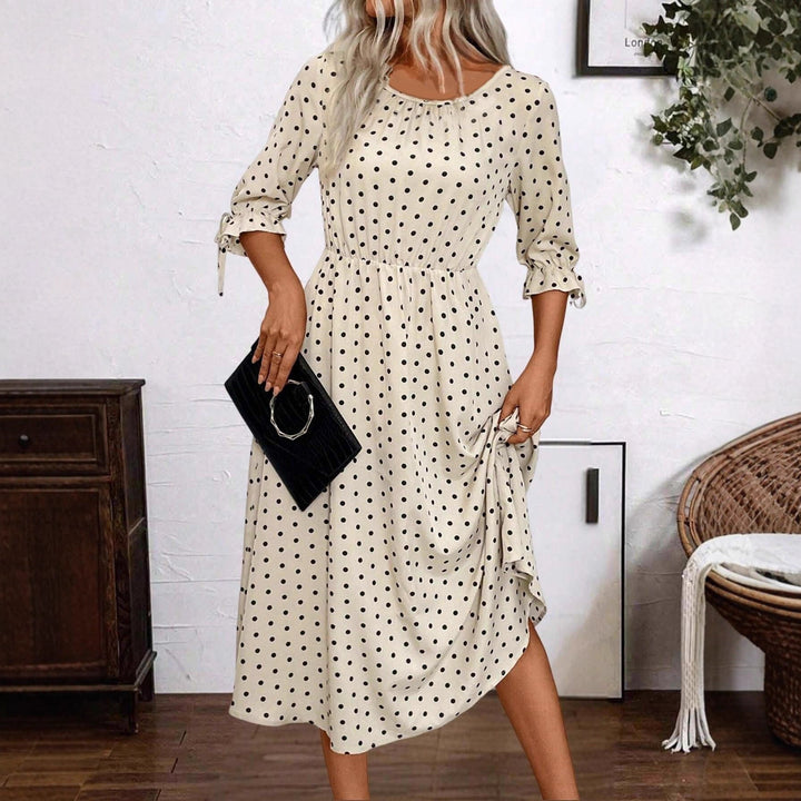Lune London puff sleeve midi dress with an elastic waist