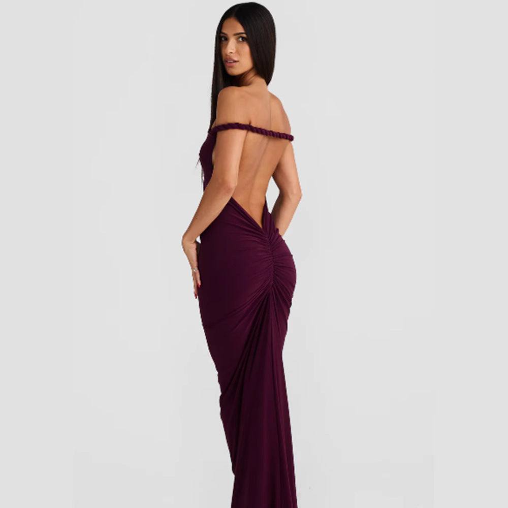Women figure-hugging evening dress with elegant halter design and swinging hem Lune London