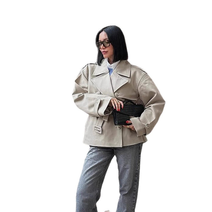 Women's short trench-style jacket with a tailored tie belt and wide sleeves Amarae