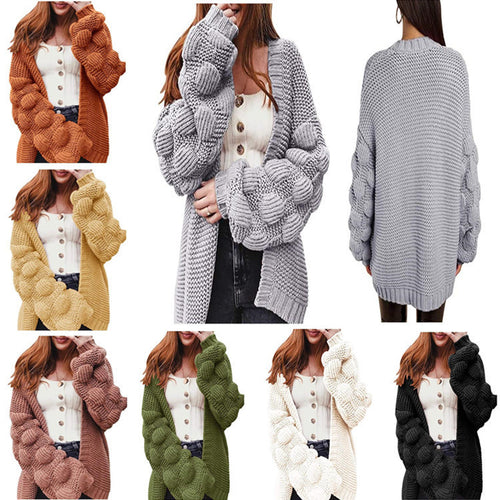 Knitted women's jacket with voluminous puff sleeves and a structured knit look Amarae