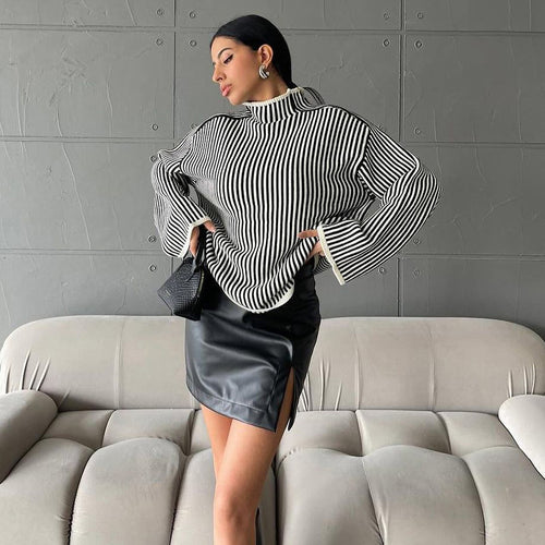 Knitted sweater for ladies with a relaxed high collar and chic elegant stripes