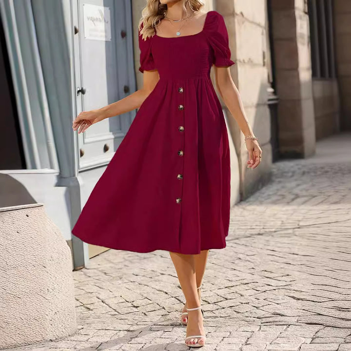 Midi dress with buttons on the front and puff sleeves Lune London
