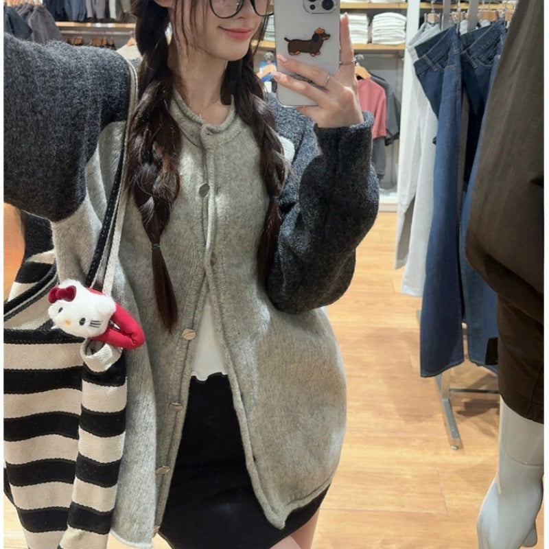 Veste en laine confortable pour femmes avec des manches contrastantes et fermeture par boutons Chic & Stil