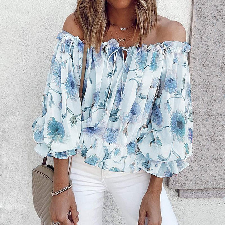 Romantic blouse for women with floral pattern and ruffled sleeves Lune London