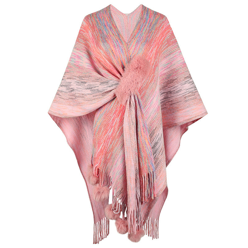 Ladies fashionable poncho with luxurious faux fur trim and creative fringes Lune London