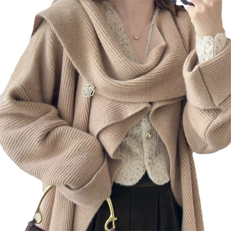 Pull en tricot épais pour femmes avec coupe asymétrique et manches volumineuses Chic & Stil