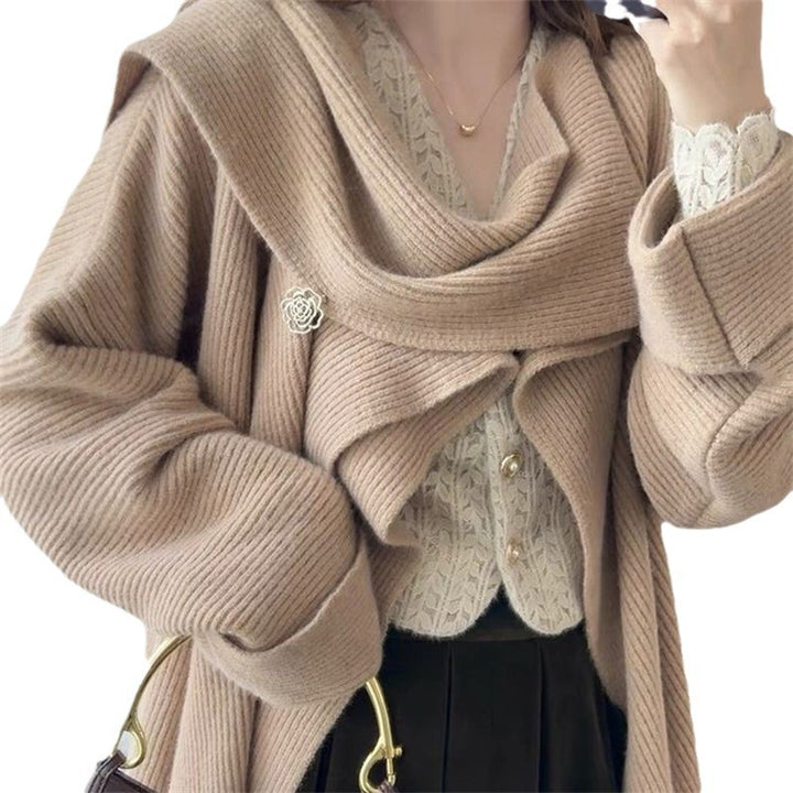 Pull en tricot épais pour femmes avec coupe asymétrique et manches volumineuses Chic & Stil