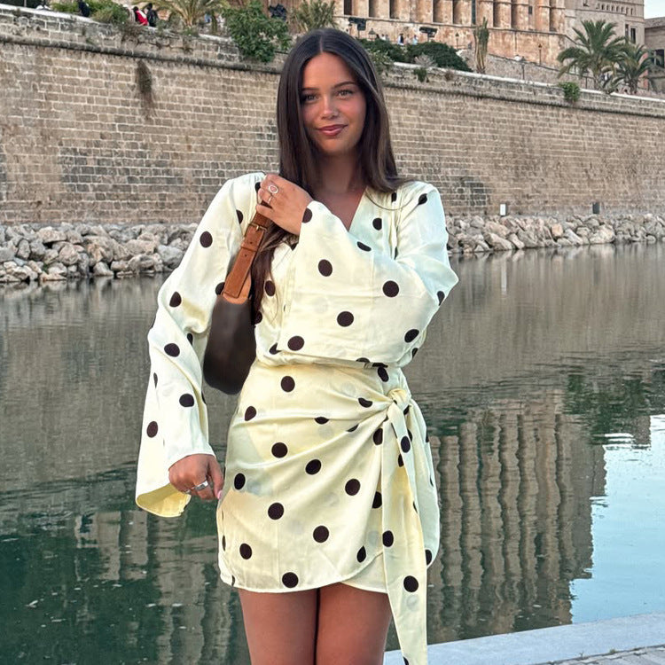 Ladies wrap mini dress with V-neck, bell sleeves and polka dot print Amarae