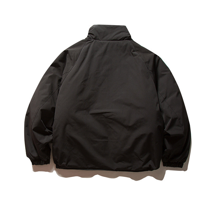 Unisex Boxy Padded Transition Jacket with High Stand-Up Collar, Elastic Cuffs and Flap Pockets Amarae