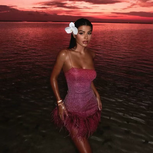 Glamorous ruffled dress for women with spaghetti straps and a feather-shaped hem Amarae