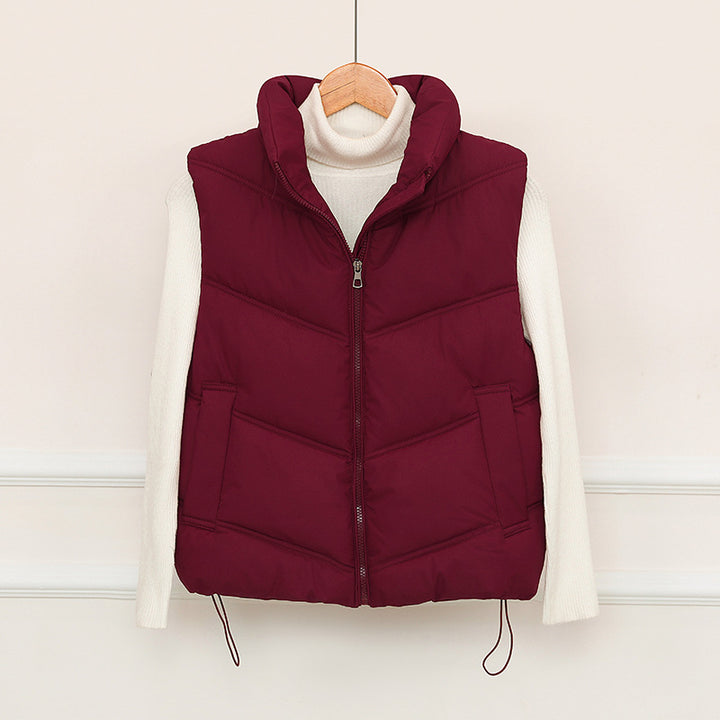 Ladies padded gilet with high collar and practical front pockets Amarae