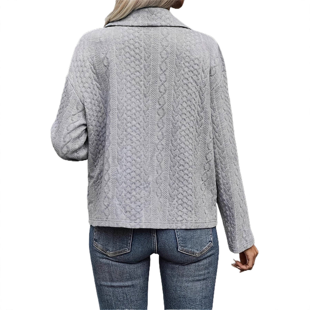 Ladies' knitted jacket with textured cable design and practical pockets Lune London