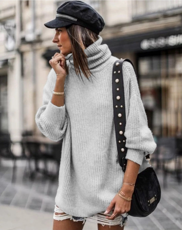 Pull en tricot épais pour femme avec col haut et détails élégants de boutons Chic & Stil