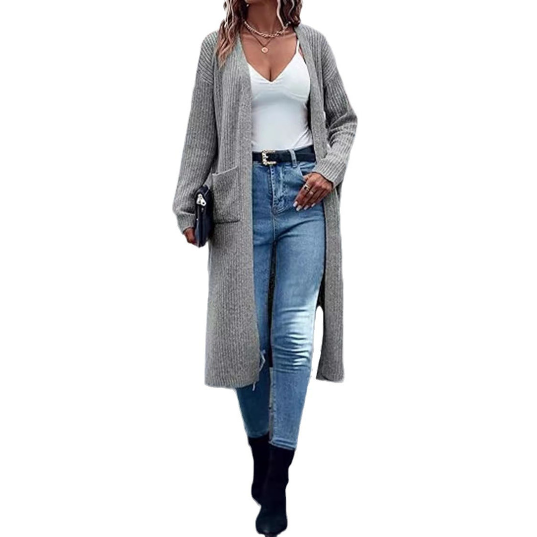 Long knit coat for women with structured design and practical pockets Lune London